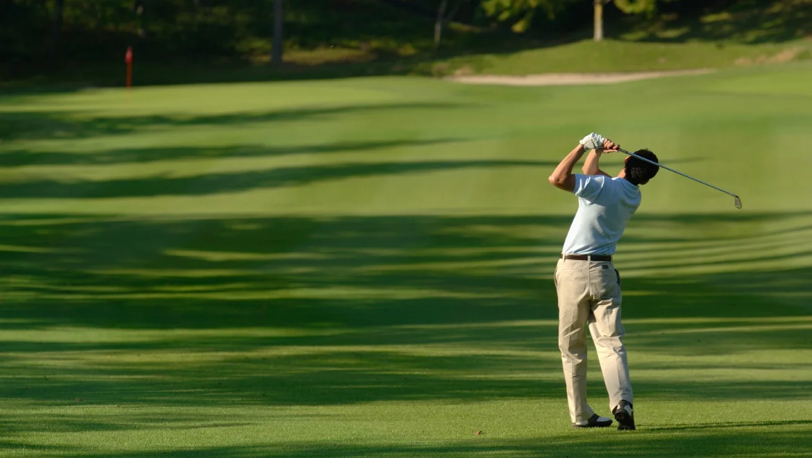 man golfing